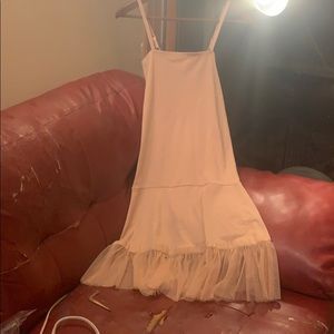 Light pink/beige soft dress with Tule accents.